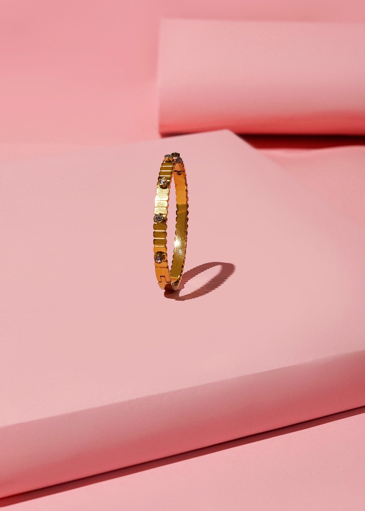 Gold Bangle with Stone Accents
