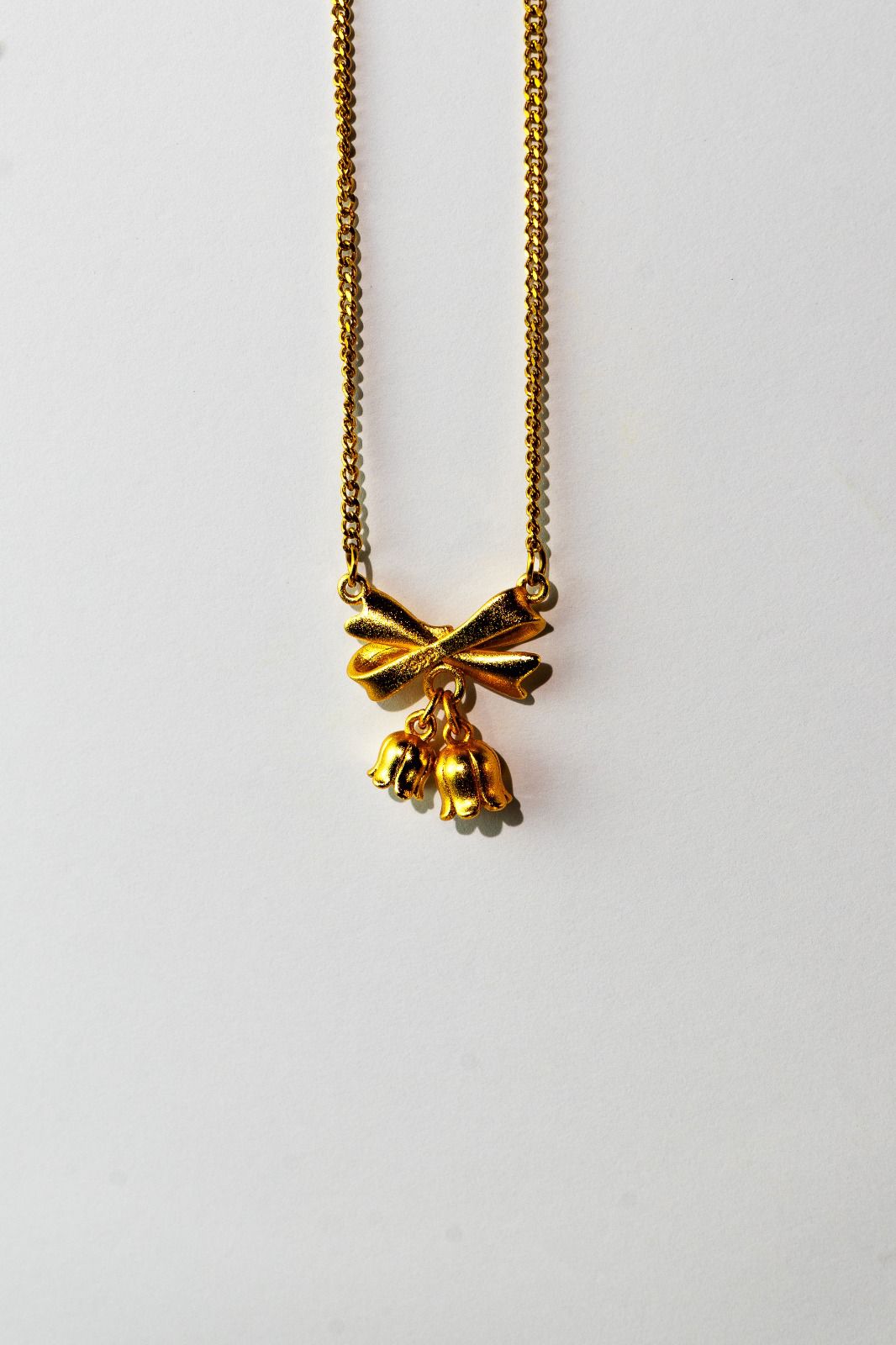 Bow with Hanging Charms Necklace